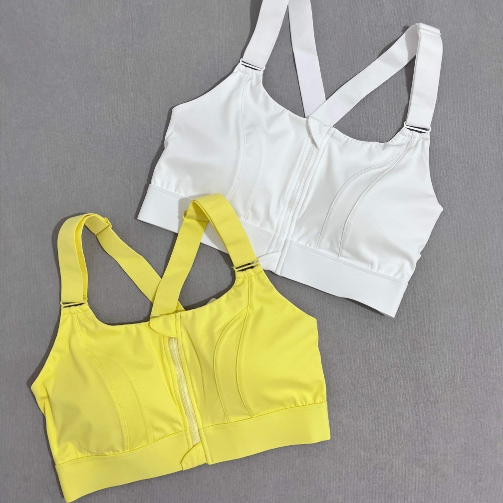 نیم تنه ورزشی زنانه با زیپ جلو و کاپ متحرک