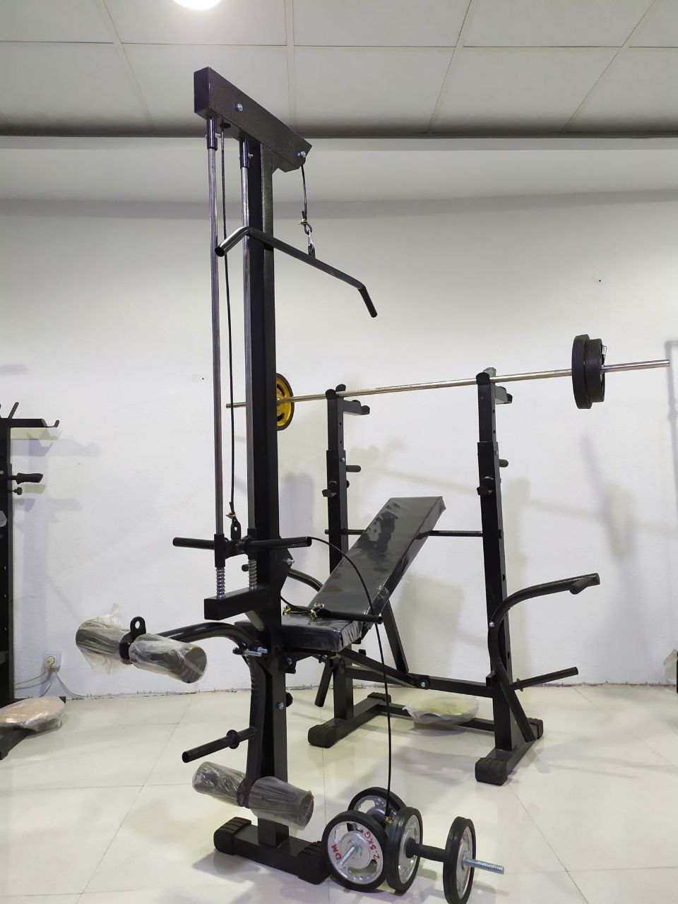 دستگاه بدنسازی ۵۲ کاره تاشو پک کامل همراه ست وزنه هالتر