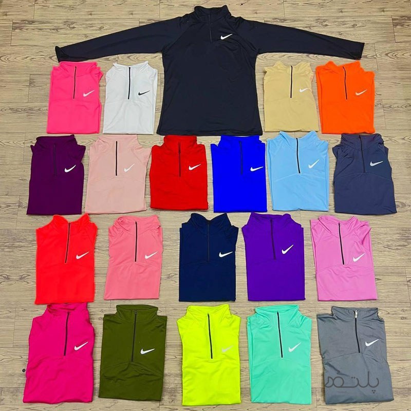 تیشرت ورزشی زنانه نایکی نیم زیپ آستین بلند فینگردار