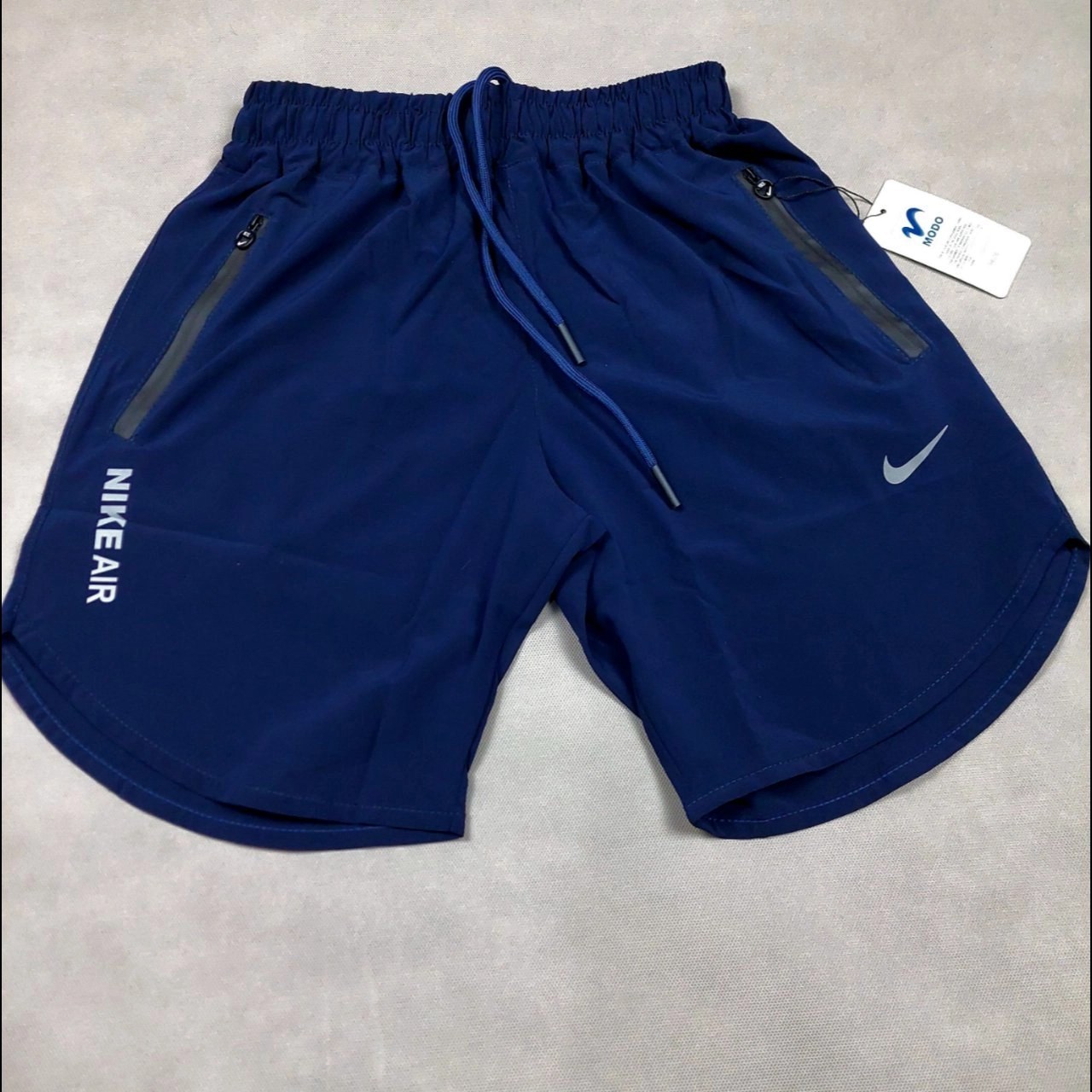 شلوارک ورزشی مردانه نایکی پارچه آیرو رنگ مشکی و سبز