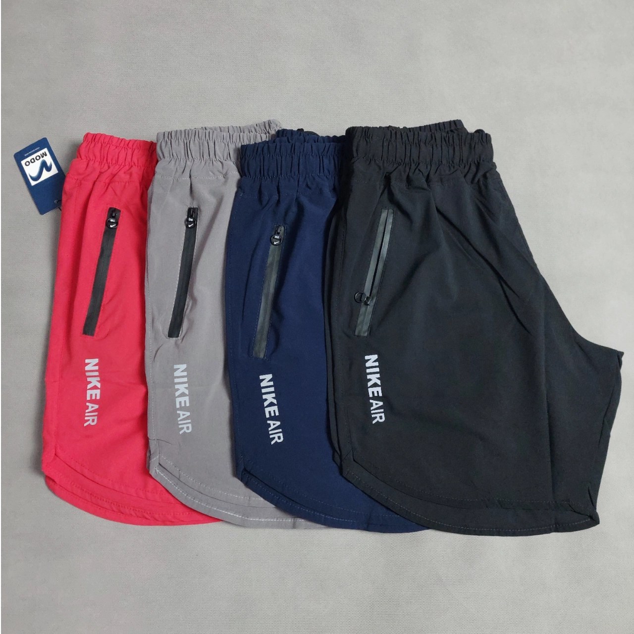 شلوارک ورزشی مردانه نایکی پارچه آیرو رنگ مشکی و سبز