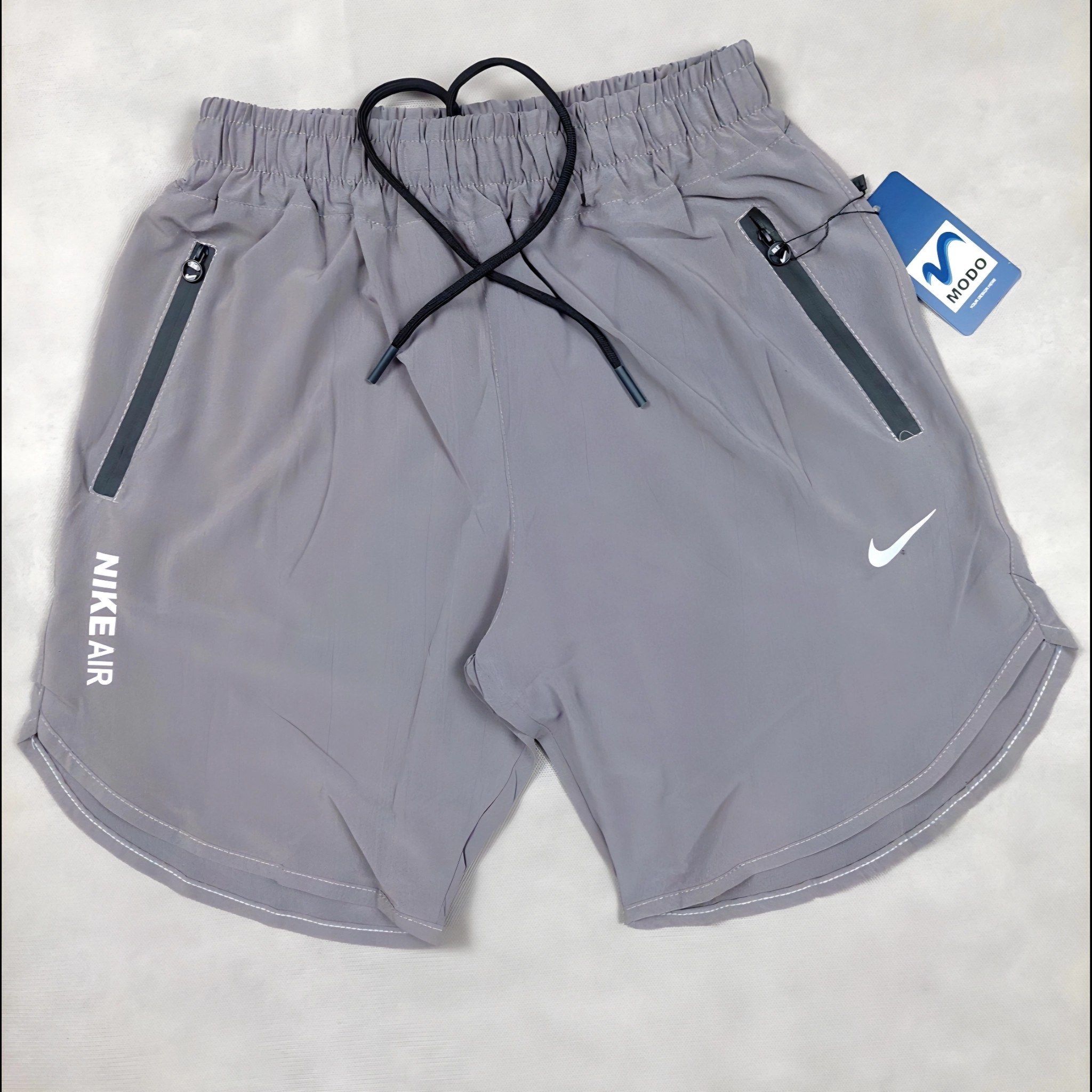 شلوارک ورزشی مردانه نایکی پارچه آیرو رنگ مشکی و سبز