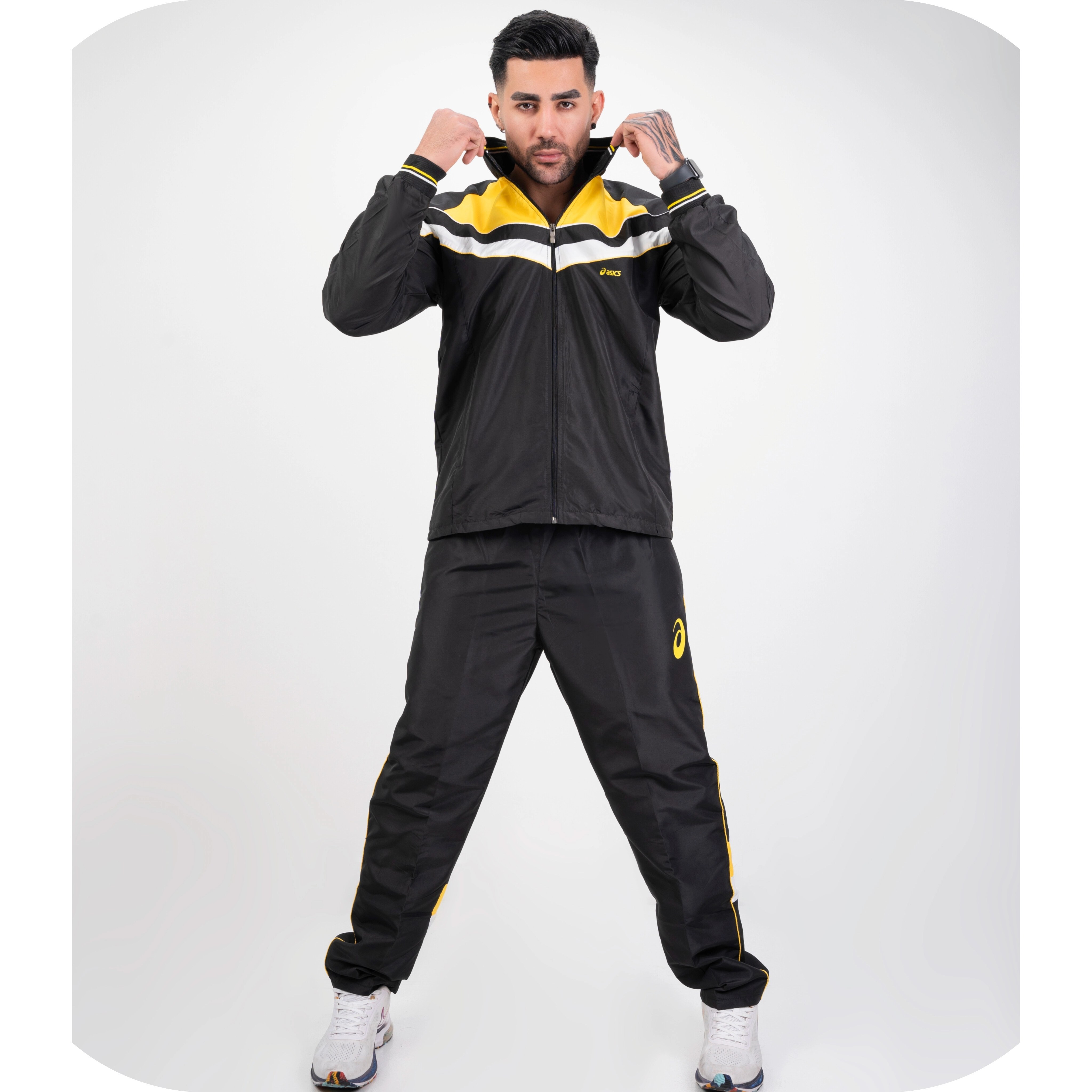 ست گرمکن شلوار مردانه اسیکس پارچه تاسلون رنگ مشکی و سرمه‌ای